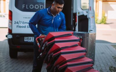 Drying wet carpet tiles in a Gold Coast flooded building